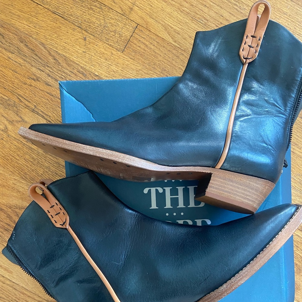 Unworn, western-inspired ankle leather boots.